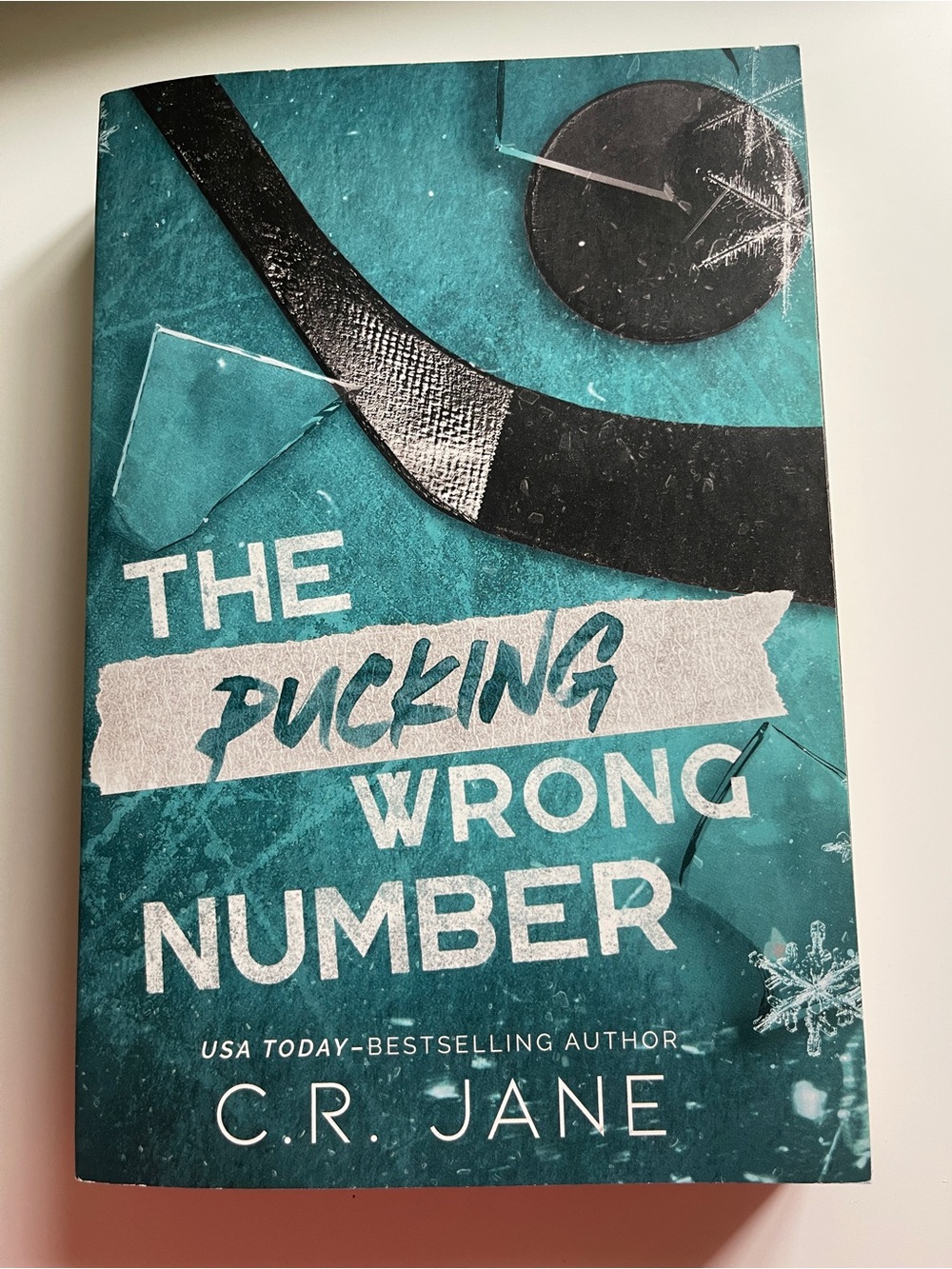 The Pucking Wrong Number by C.R. Jane - Teal & Black Cover